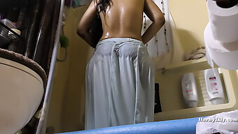 A South Indian Maid Cleaning The Restroom And Taking A Shower On Camera