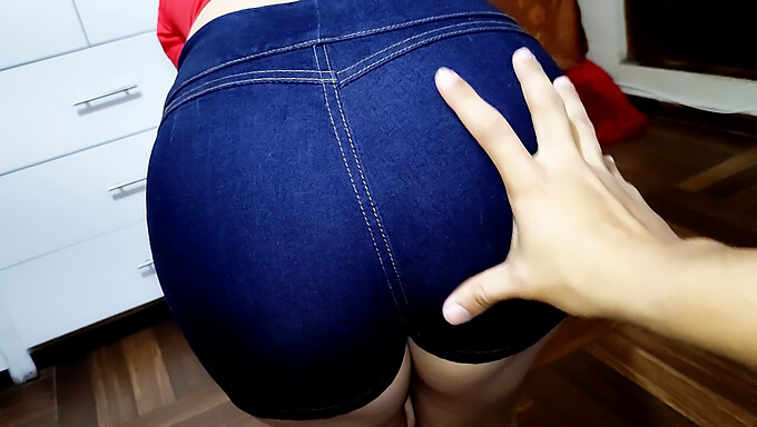 Amateur Latina girl demonstrates new denim shorts on camera