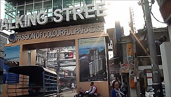 Strolling Along Pattaya'S Pedestrian Thoroughfare During The Day